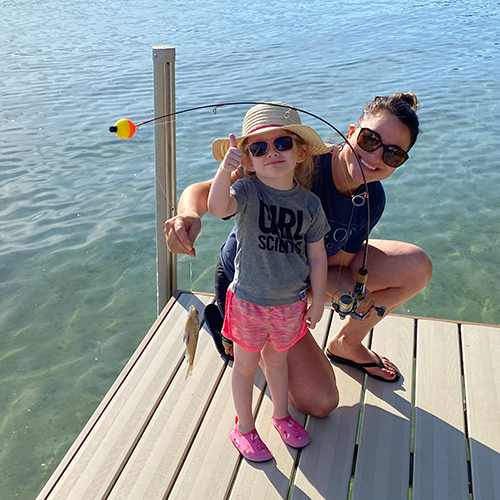 Amber fishing with her daughter