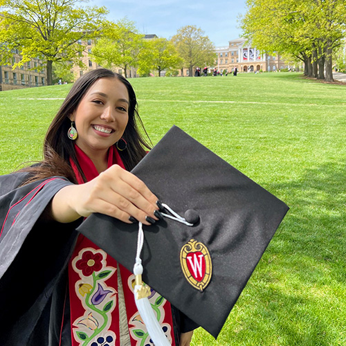 Mel with UW Madison diploma