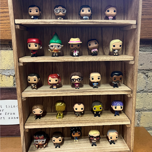 lots of figurines on a shelf