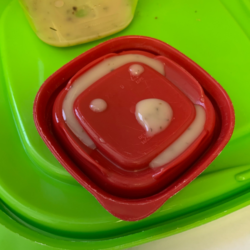 smiley face on soup container lid