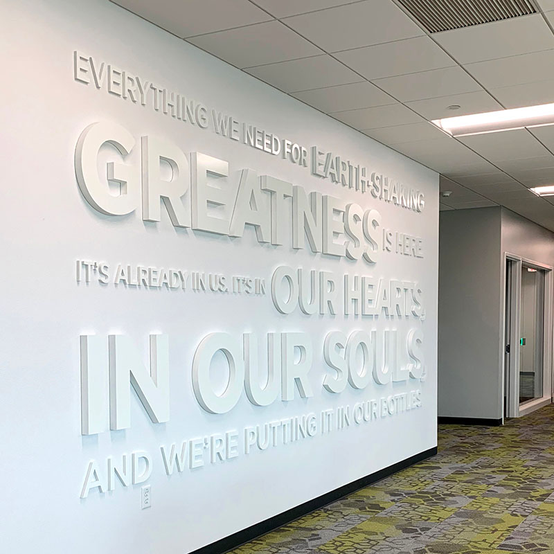Nature's Way interior wall with raise environmental branding lettering